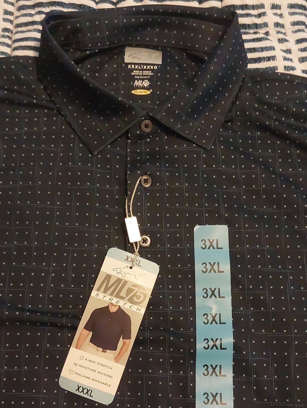 Greg Norman Collection Black Polo with Light Blue Micro Dot Pattern